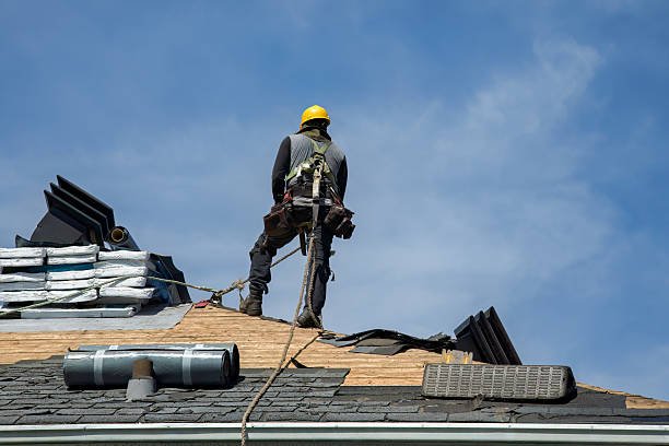 Professional Metal Roofing technician working in Fall Creek, WI